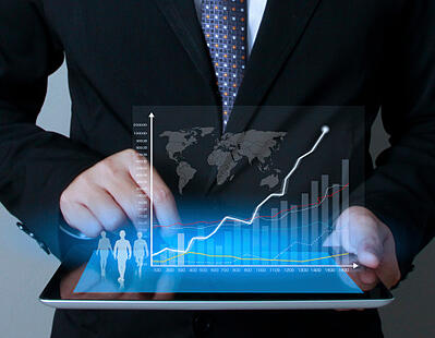 Healthcare marketer looking at graph